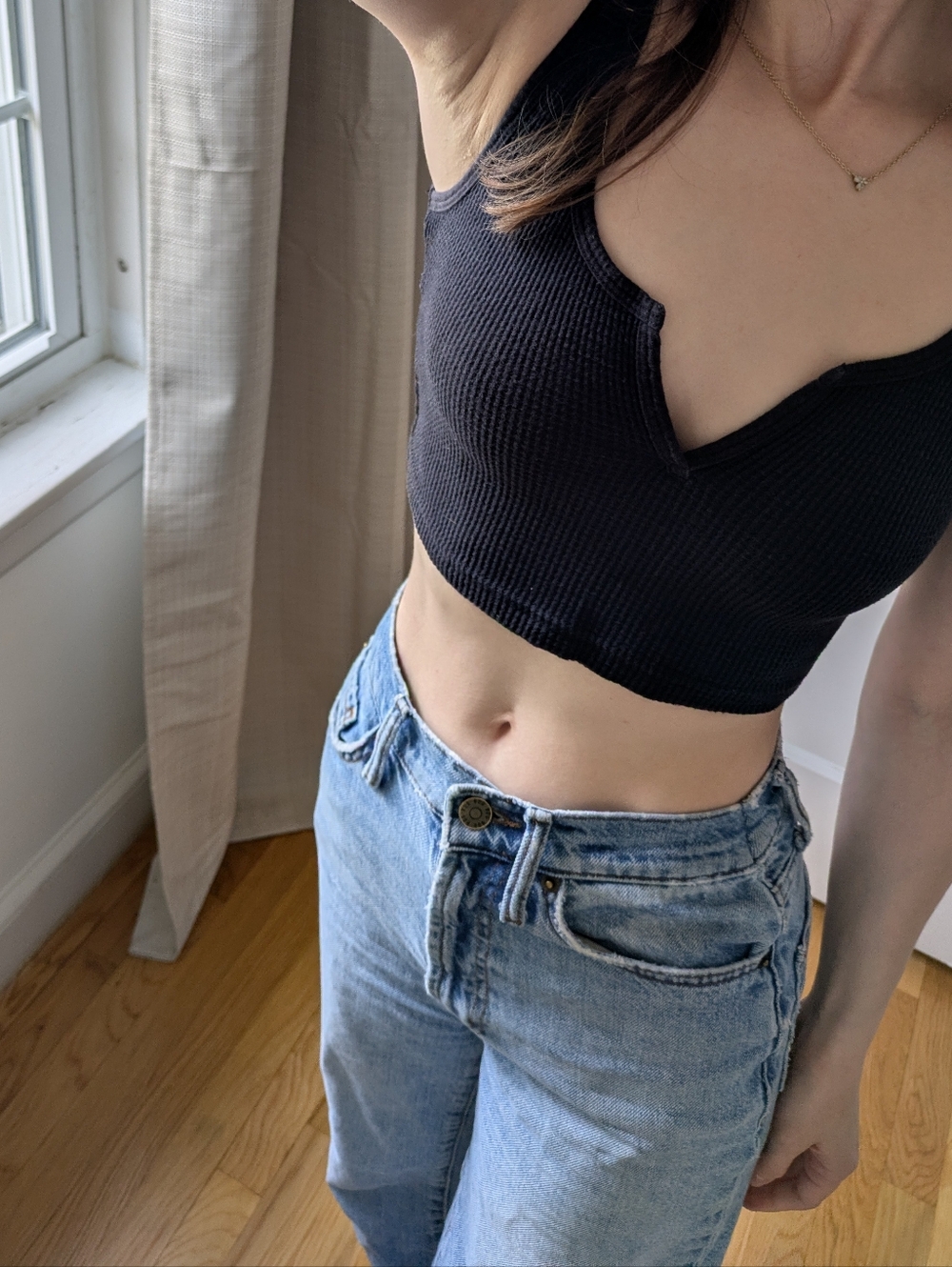Black TNA Waffle Notch Tank top from Aritzia